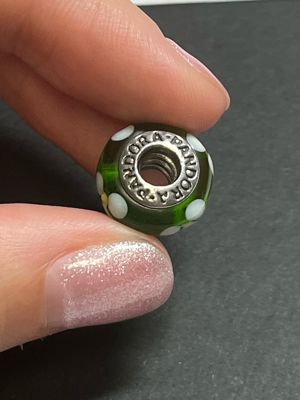 Pandora sterling silver glass Murano bead
925
Flower design